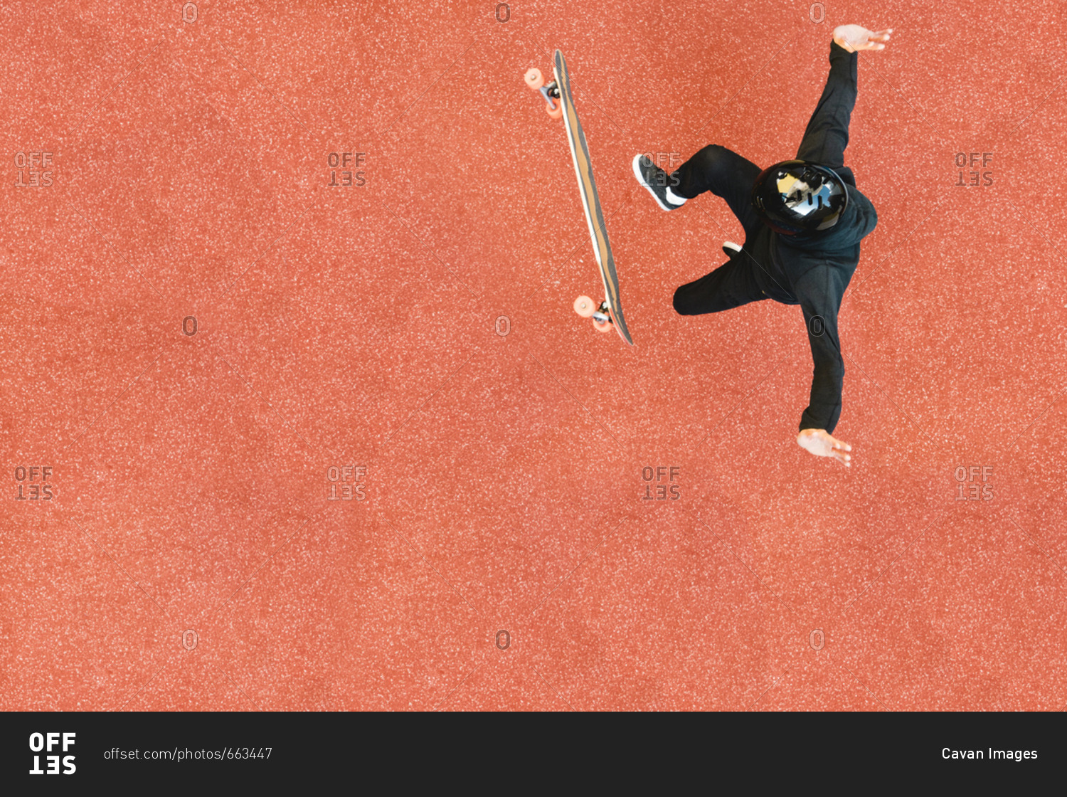 High angle view of man skateboarding on orange floor at skateboard park