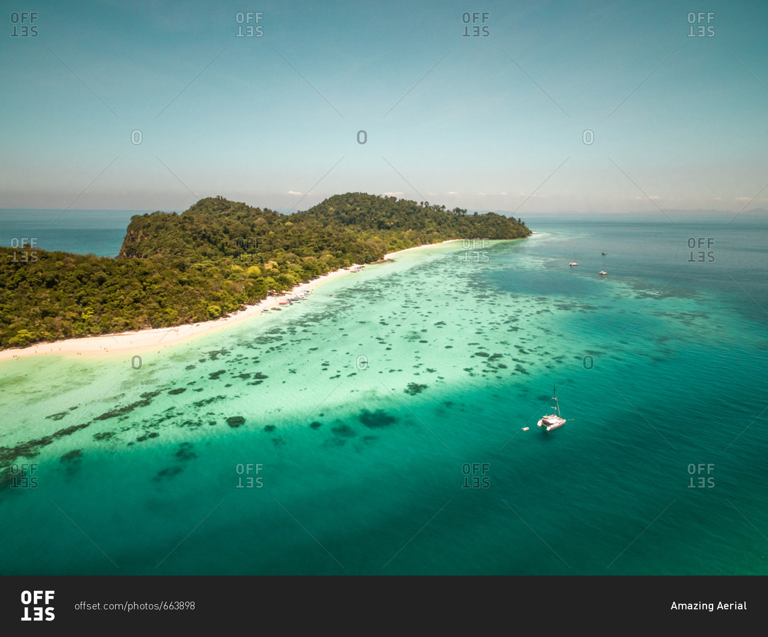 Aerial view of boats moored in the bay of Koh Rok Yai Beach island in Thailand