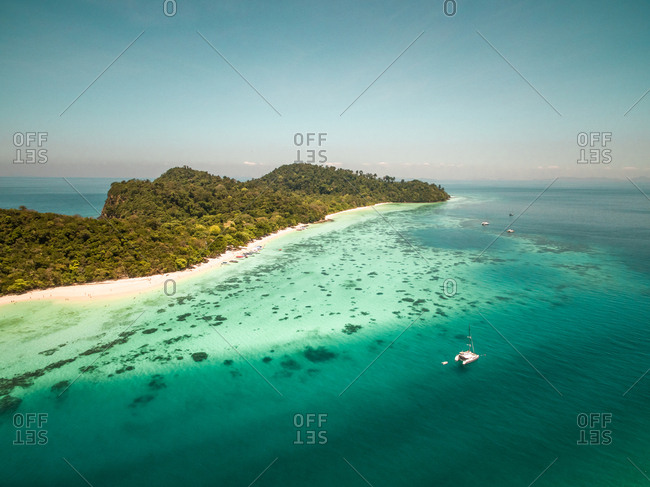 Aerial view of boats moored in the bay of Koh Rok Yai Beach island in Thailand