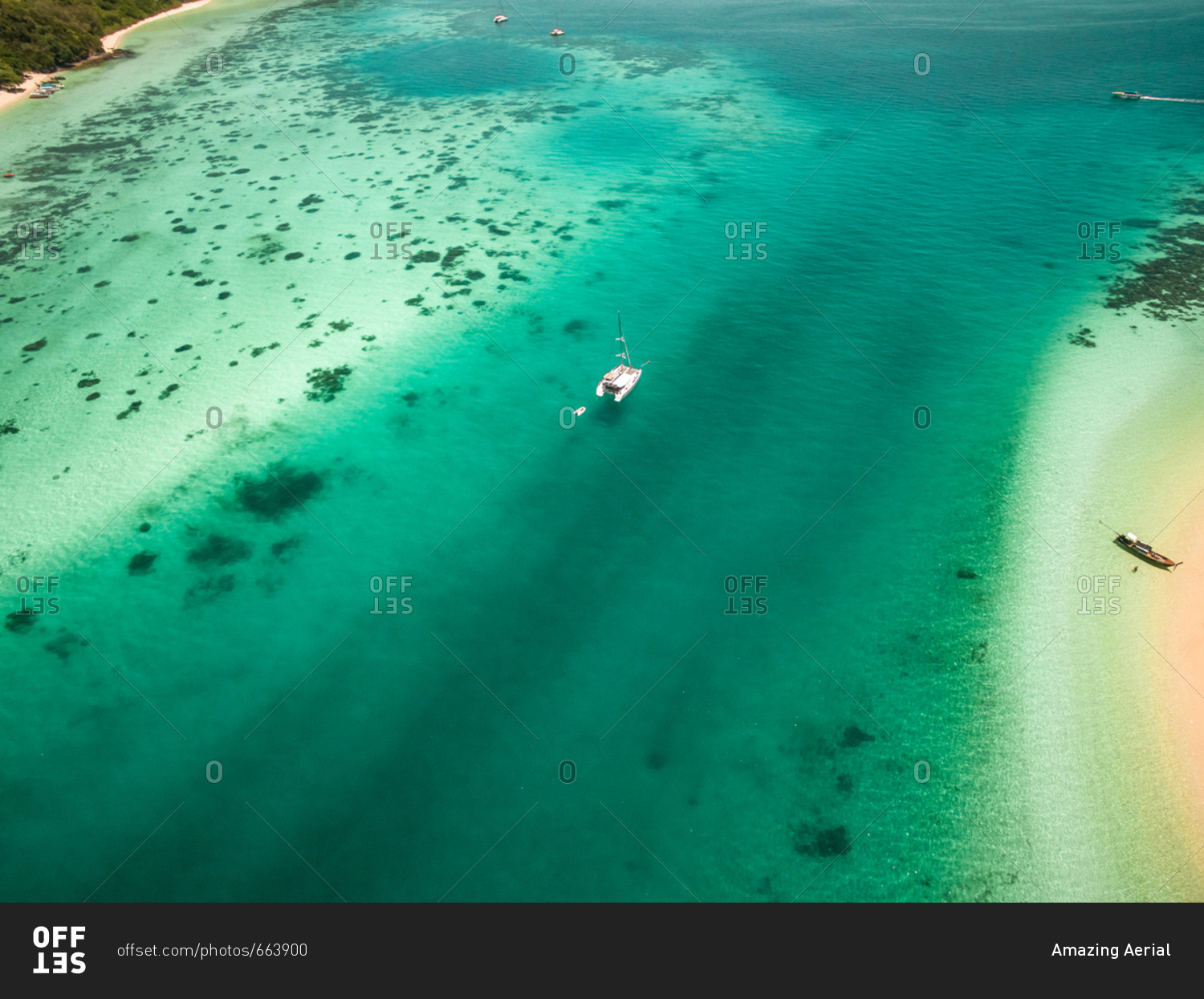 Aerial view of boats moored in the bay of Koh Rok Yai island in Thailand