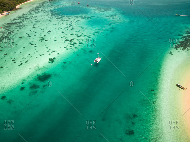Aerial view of boats moored in the bay of Koh Rok Yai island in Thailand
