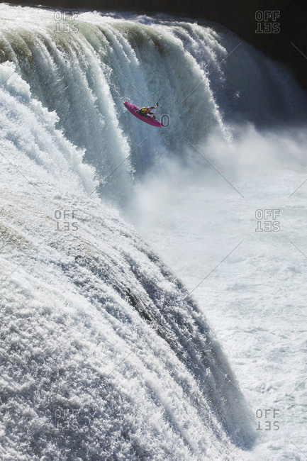 Agua Azul, Chiapas, Mexico - May 12, 2014: Kayaker running down waterfall of Agua Azul, Chiapas, Mexico