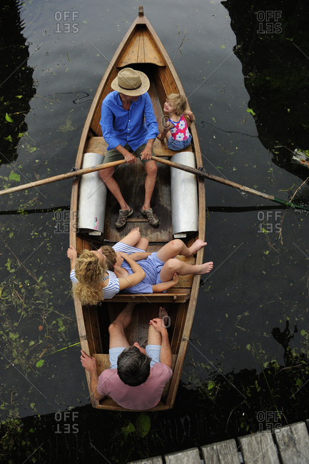 Family in rowing boat- top view