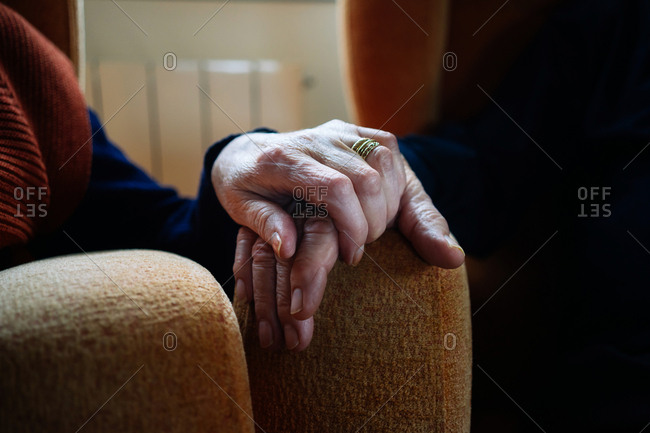 Elderly couple holding relaxing together and holding hands