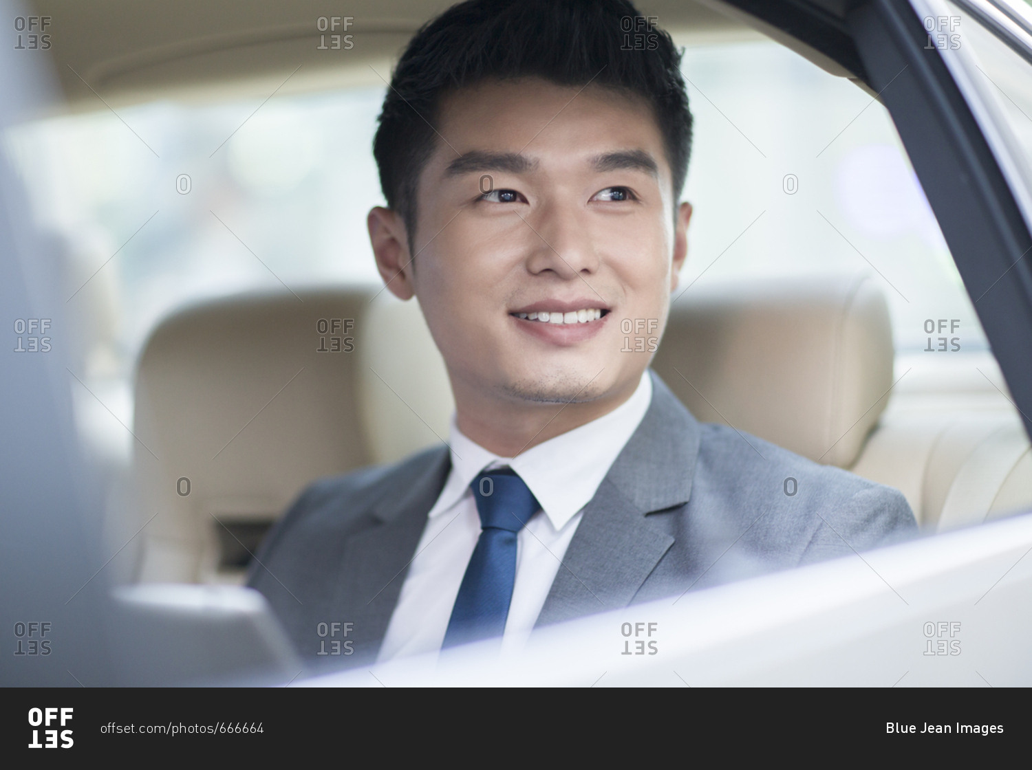 Chinese Businessman Sitting In Car Back Seat Stock Photo Offset