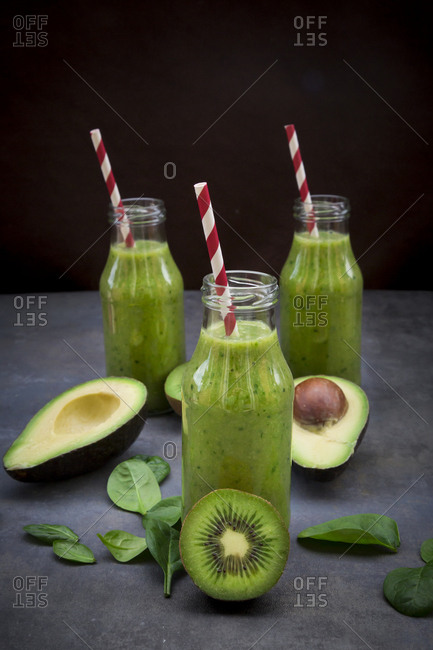Green detox smoothie with avocado- kiwi and baby spinach