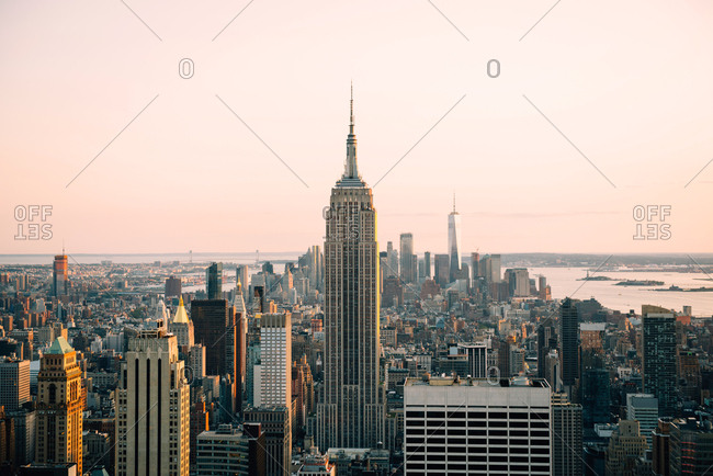 New York City - September 11, 2017: Top of New York buildings at sunset