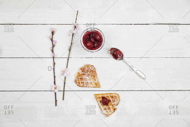 homemade waffles with cherries- waffle hearts with cherry blossom decoration