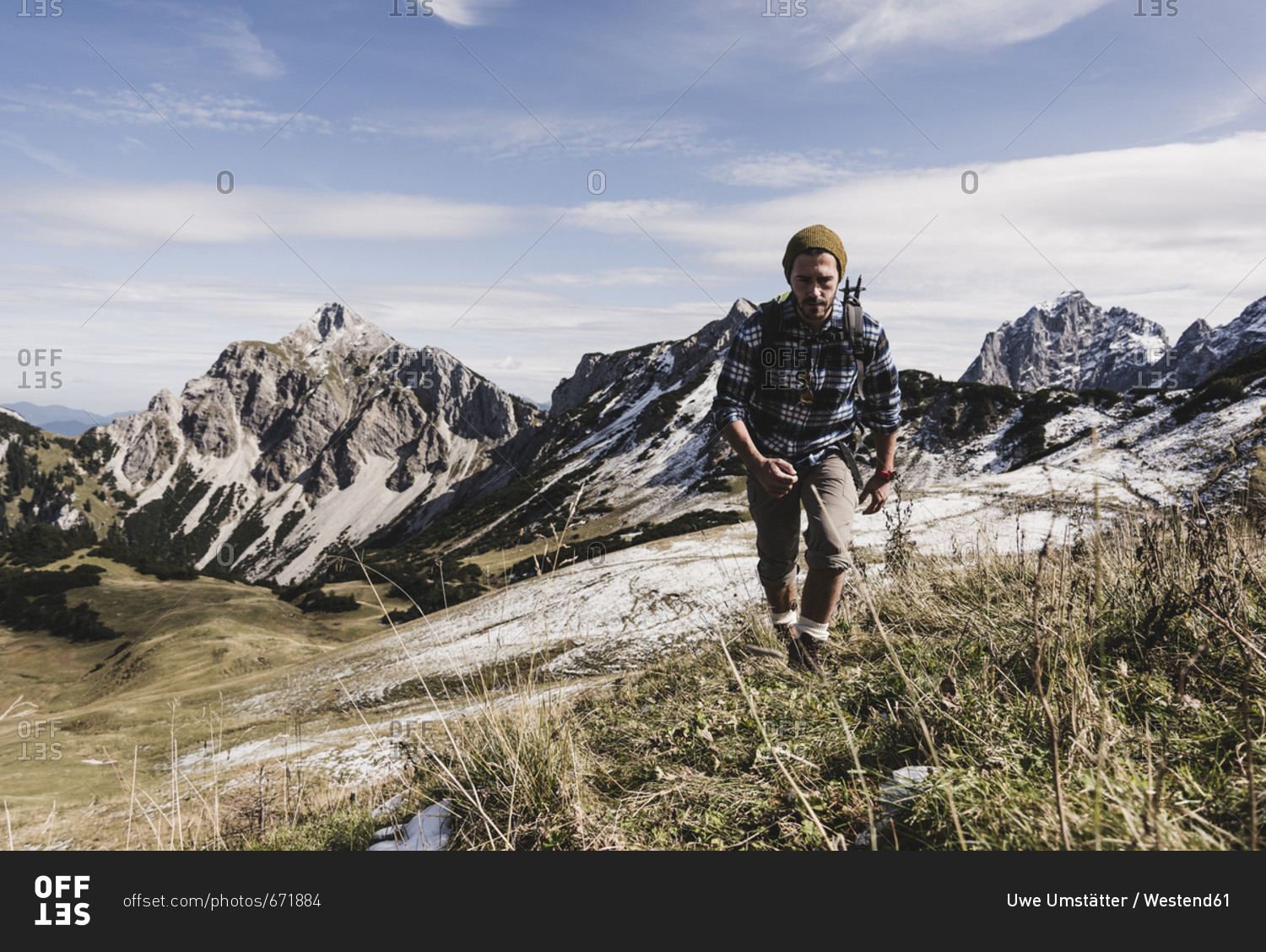 Austria- Tyrol- young man hiking in the mountains