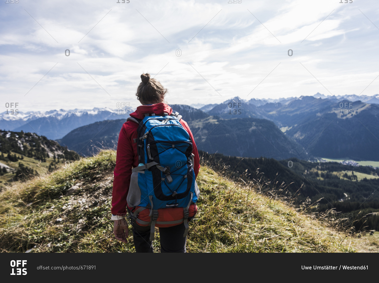 Austria- Tyrol- young woman hiking in the mountains