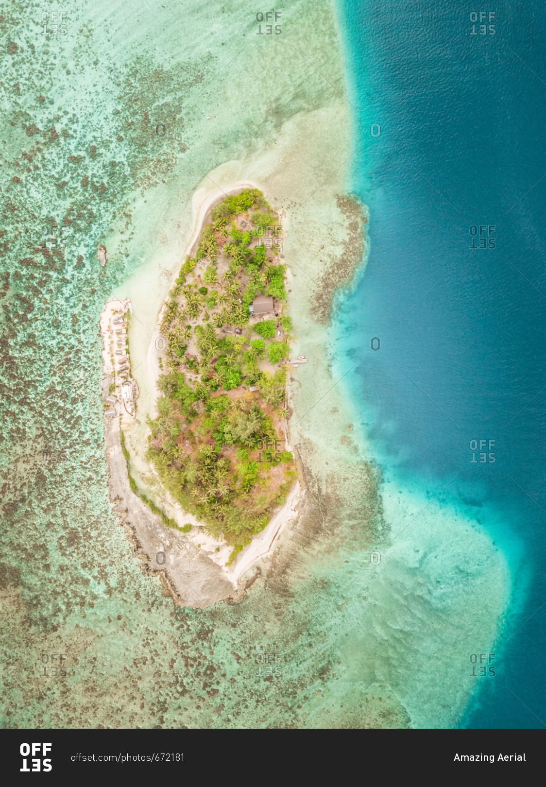 Aerial view of small island Motu Aki  in French Polynesia.
