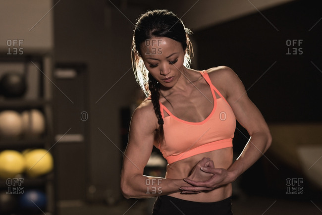 female muscular arm stock photos - OFFSET