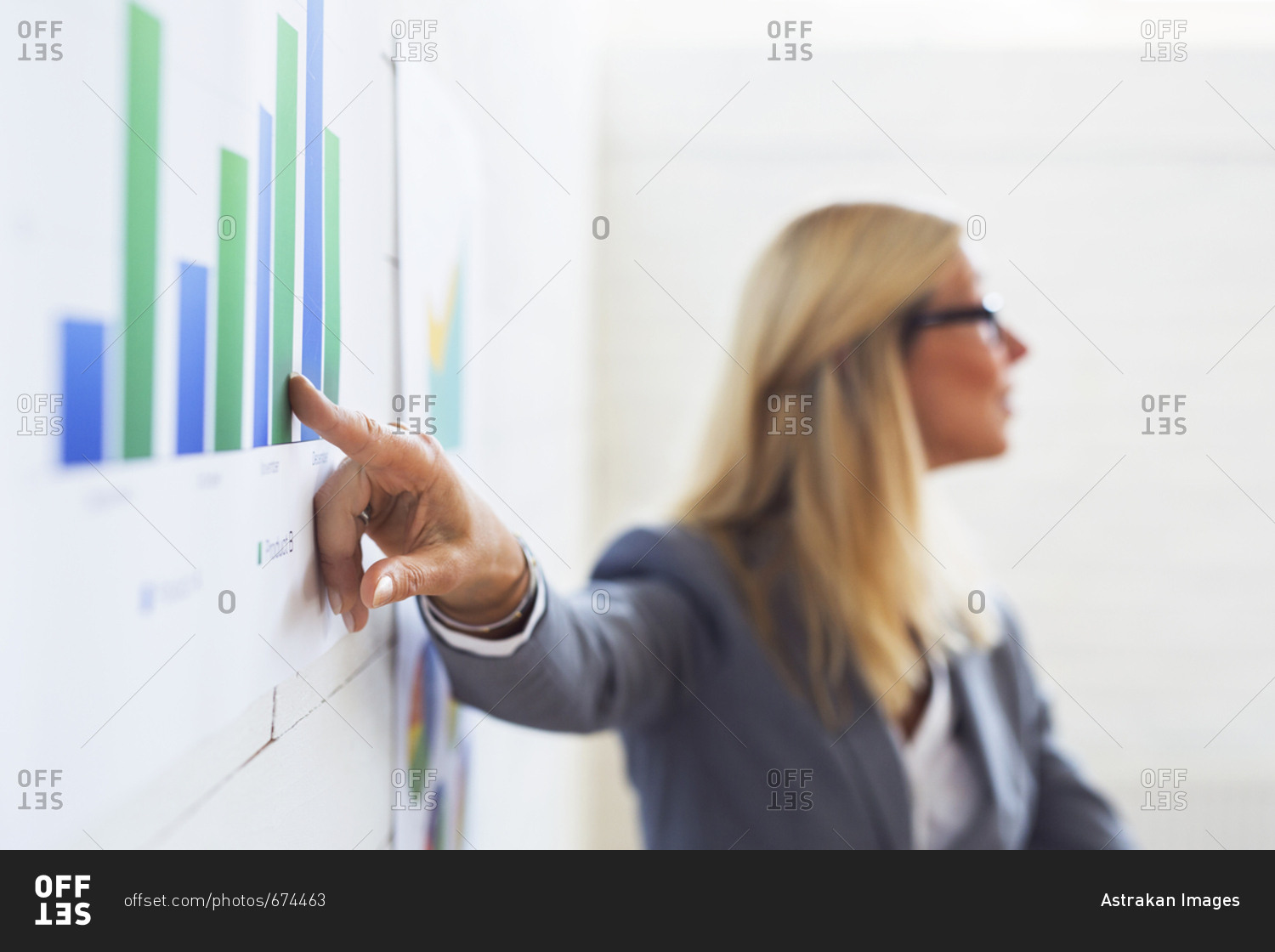 Woman giving presentation about companies sales statistics
