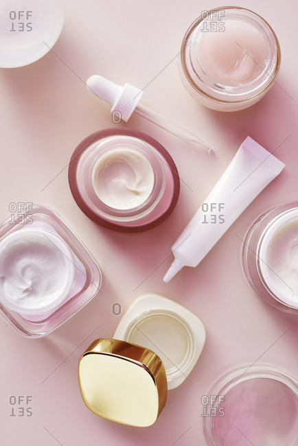 Beauty products on pink background