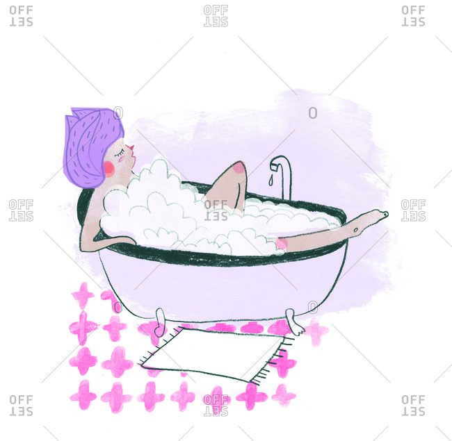 A woman relaxing while having a bath