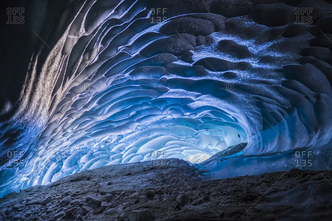 Alaska, United States of America - March 1, 2015: Light Shines Into A Cave Within Canwell Glacier In The Alaska Range, Hdr Composite; Alaska, United States Of America