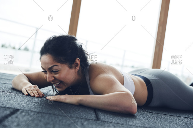 Woman lying down on floor