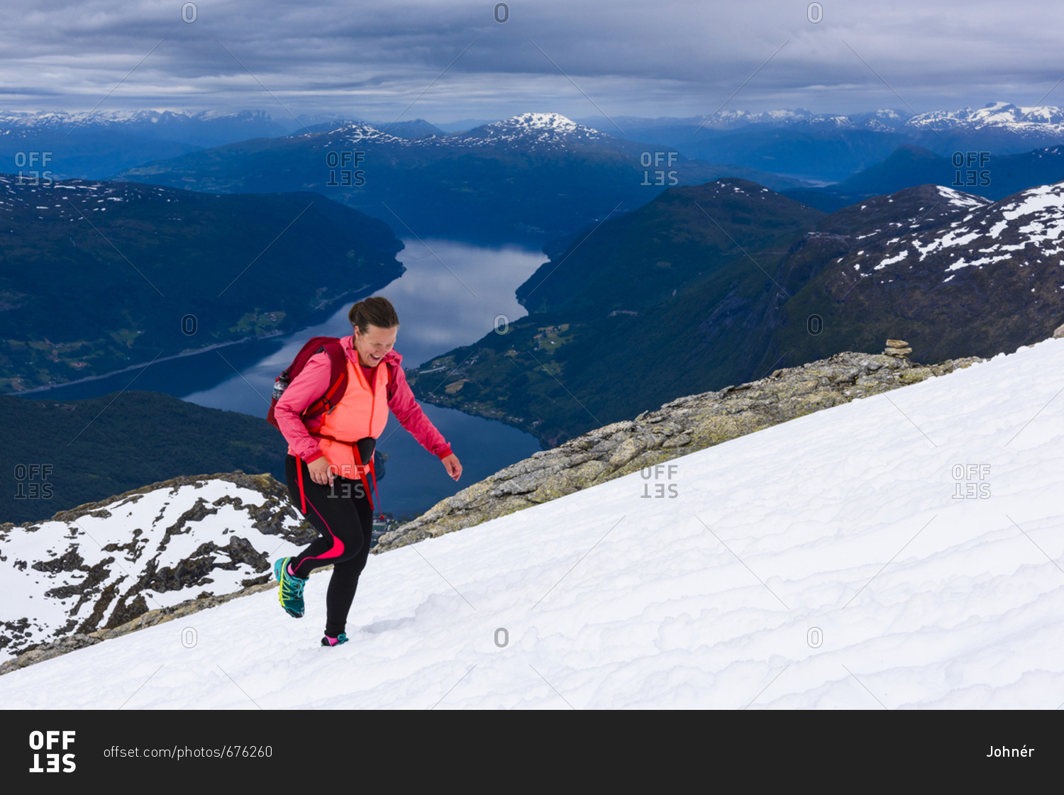 Woman hiking in snowy landscape