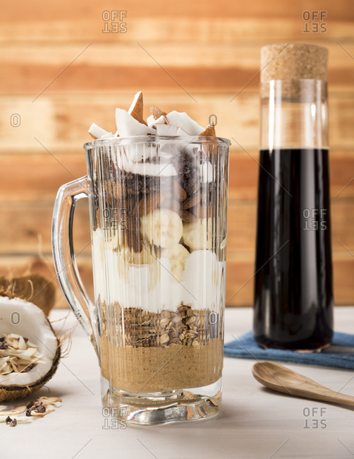 Blender full of ingredients to make a healthy smoothie