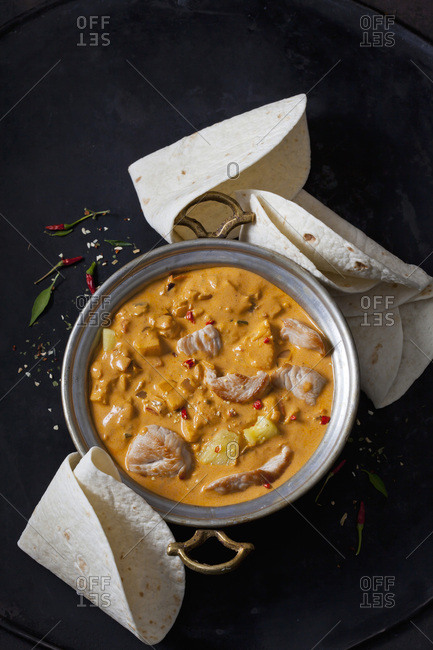 Curry dish with turkey and pineapple in curry sauce