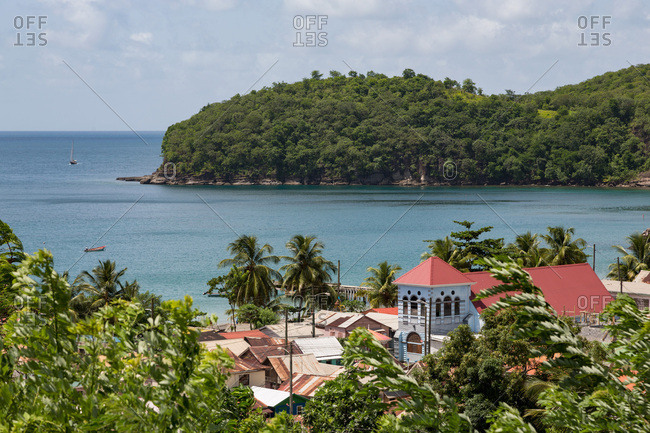 Church in the small town of Canaries, with Canaries Bay beyond, St. Lucia, Windward Islands, West Indies Caribbean, Central America