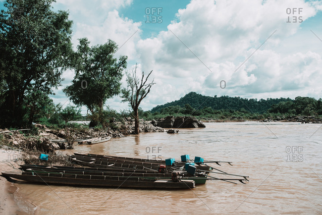 Boats on dirty river