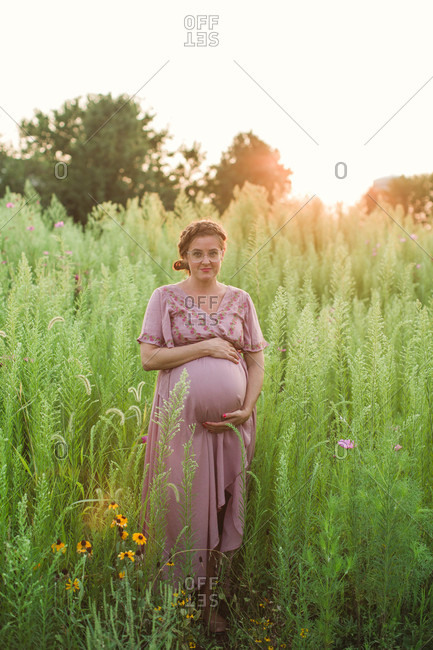 Outdoor maternity portrait at sunset