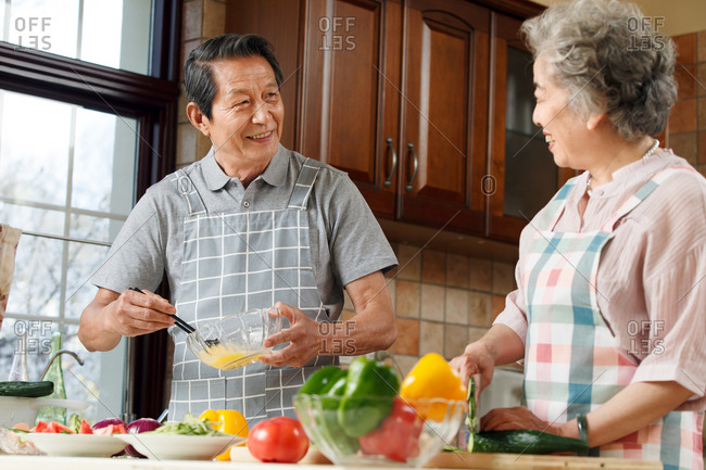 The old couple are in the kitchen