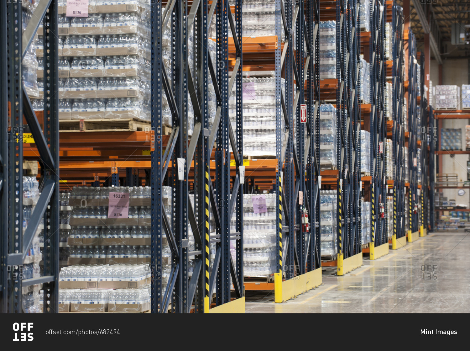 Interior of a warehouse showing flavored bottled water stored on
