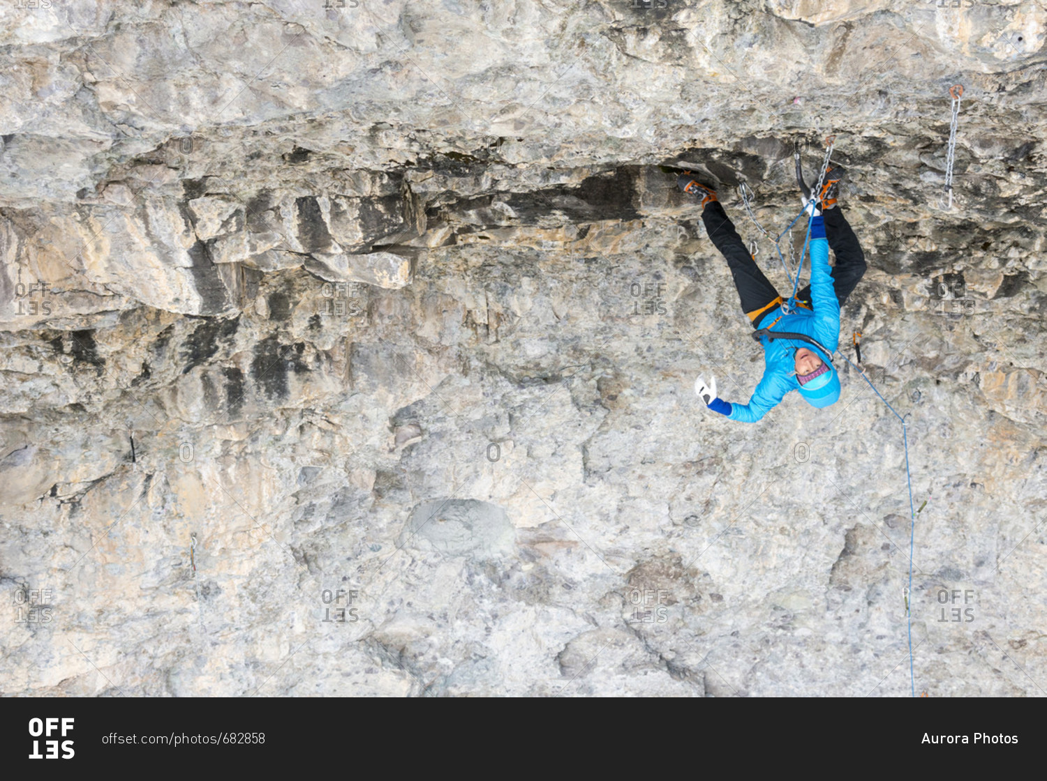 Woman rock climbing cave route called Zero to Hero at Hall of Justice cave, Camp Bird Road, Uncompahgre National Forest, Ouray, Colorado, USA