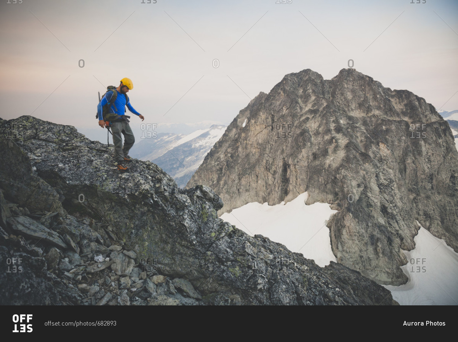 Side view of person mountaineering on Ashlu Mountain in Coast Mountain Range of British Columbia, Canada