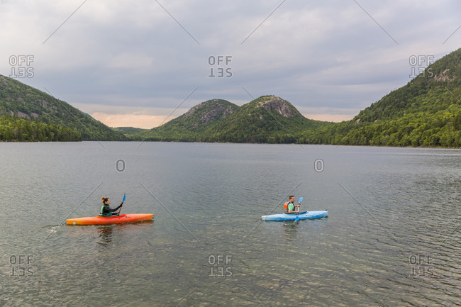 Couple kayaking on Jordan Pond in Acadia National Park, Maine, USA
