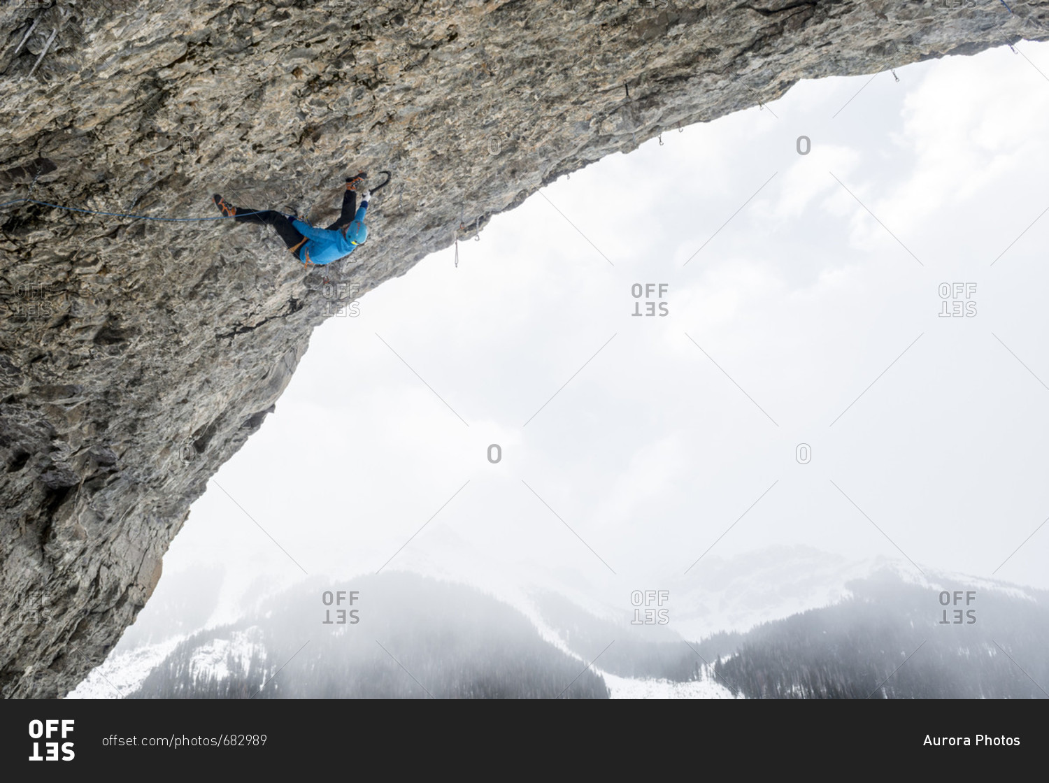 Man rock climbing overhanging cave route called Pull the Trigger Tigga at Hall of Justice, Camp Bird Road, Uncompahgre National Forest, Ouray, Colorado, USA