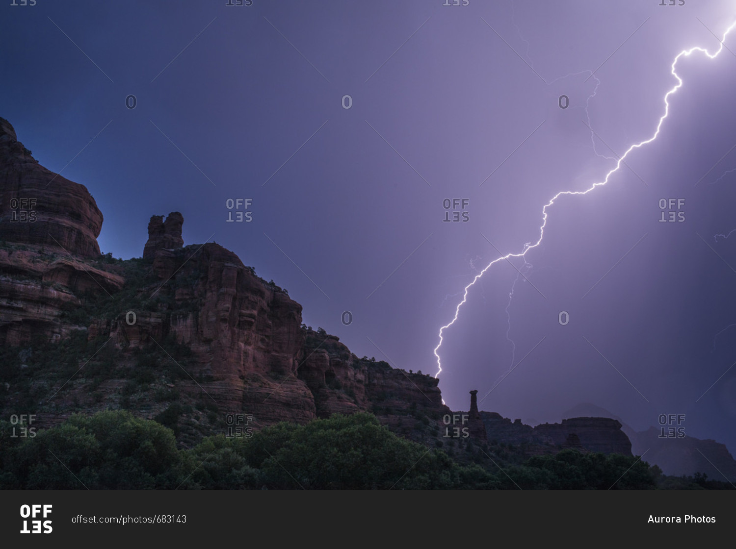 Lightning above rock formations during monsoon, Sedona, Arizona, USA