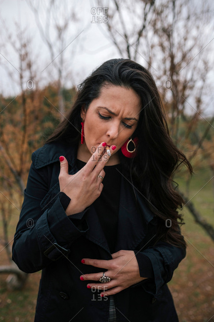 Brunette Smoking