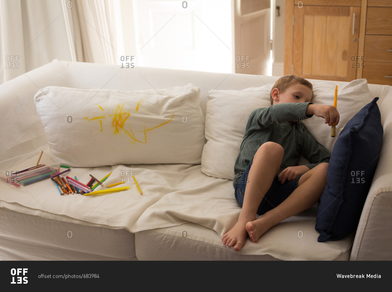 Boy With One Foot In Living Room