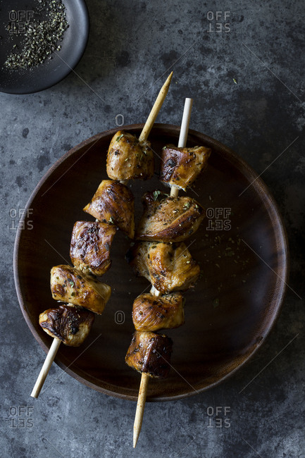 Skewers of chicken breast on a plate