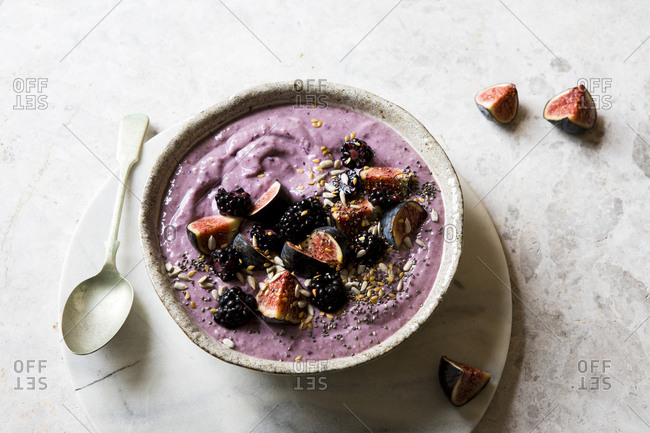 Smoothie bowl with blackberries and fig
