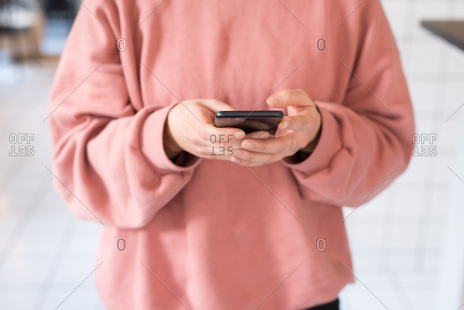 Close up of woman holding a cell phone
