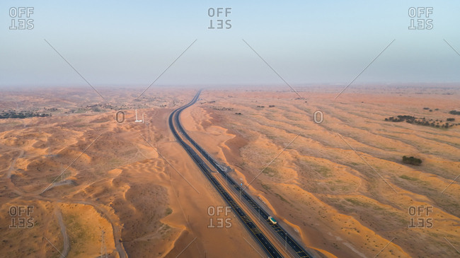Aerial view of empty roads in the desert of Umm Al Quawain, UAE