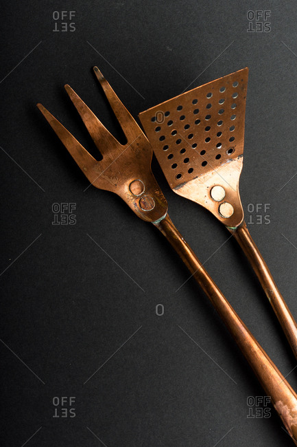 Overhead Image Of Old Fashioned Copper Kitchen Utensils On Gray