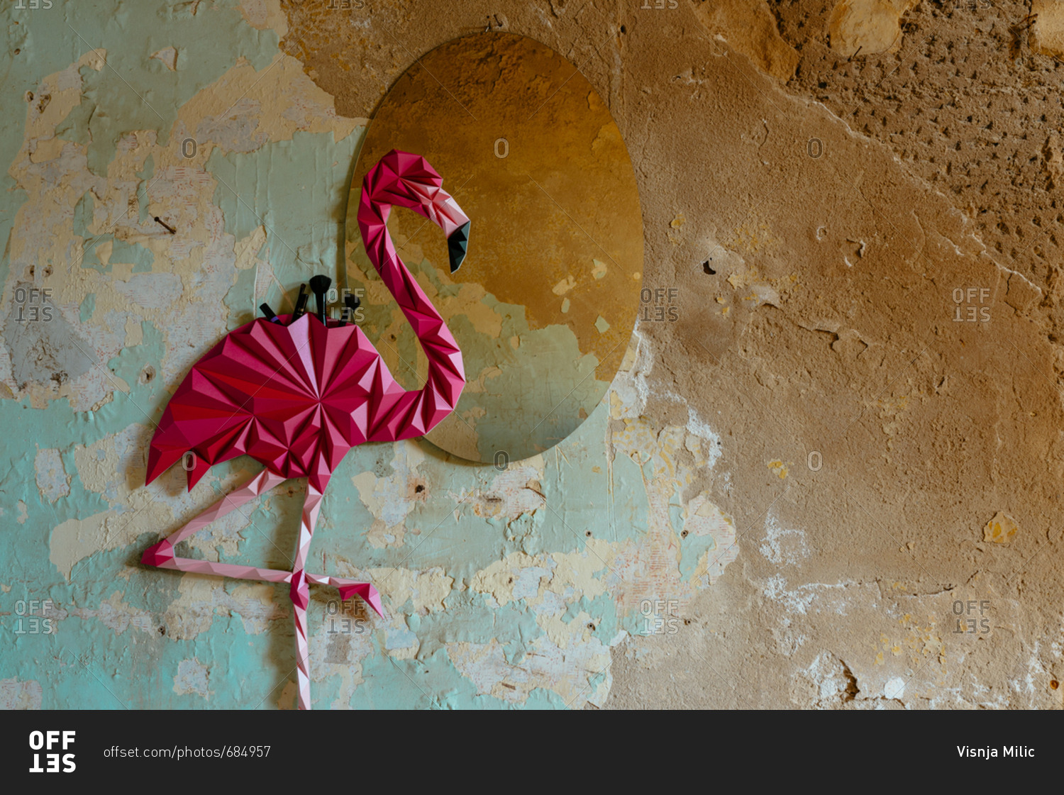 Origami flamingo bird made as home decoration shelf and a mirror
