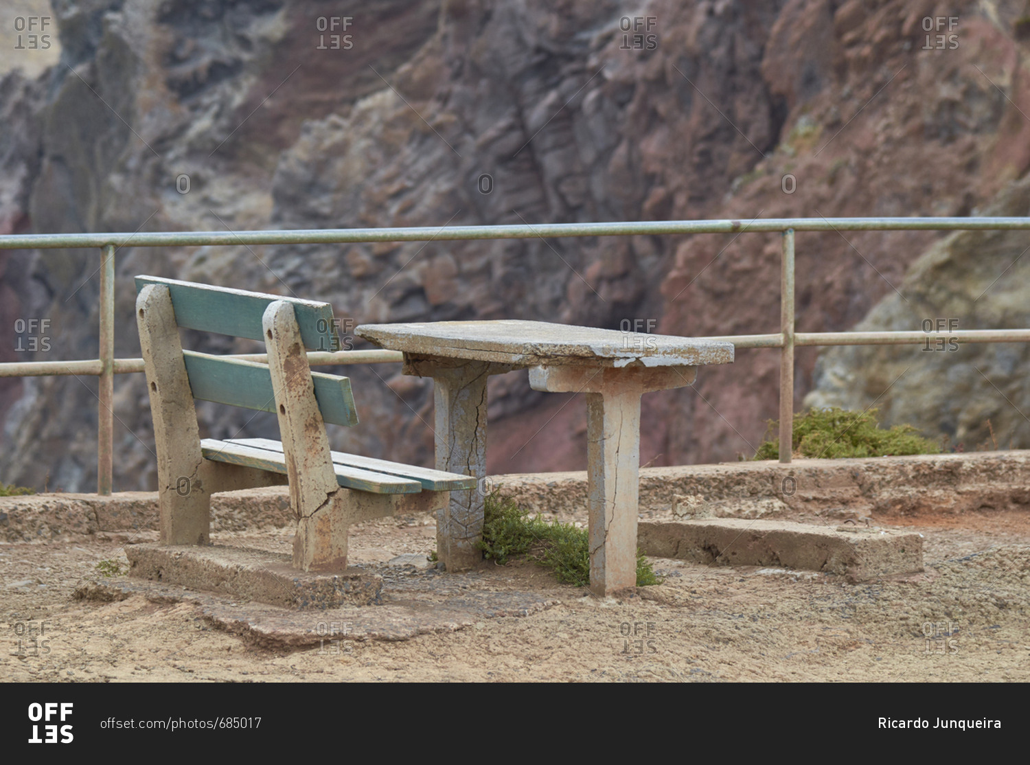 Weather beaten bench and table for hikers to rest