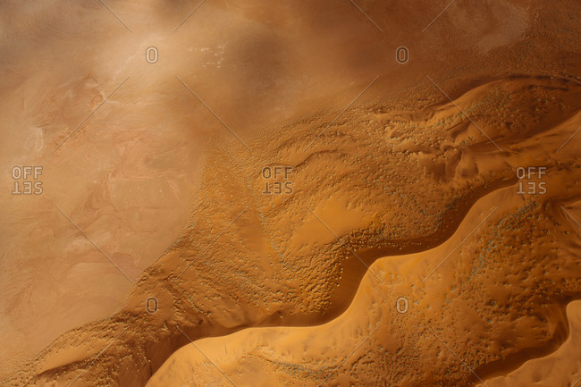 An aerial of the red sand dunes of the Namib Desert
