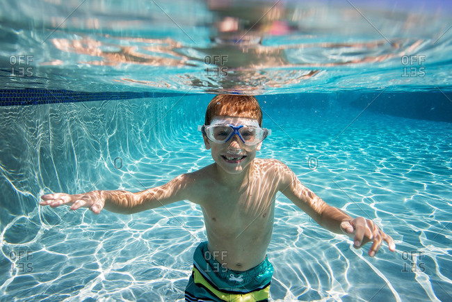 Underwater view of boy in a swimming pool