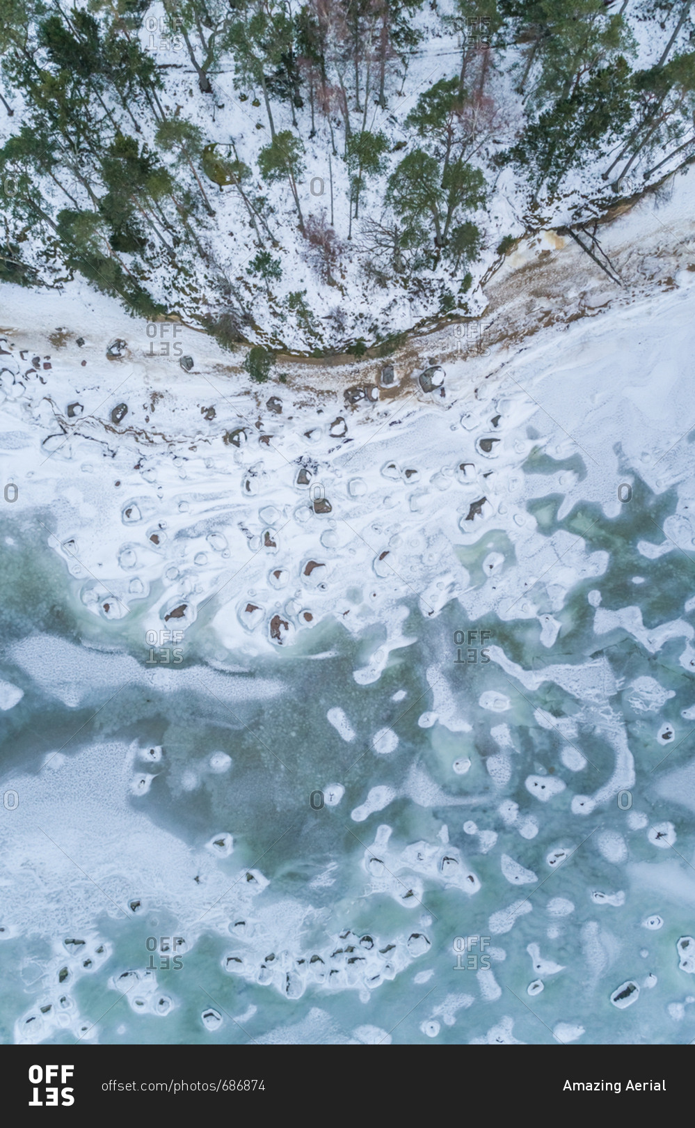 Aerial view of the frozen rocky sea on the coast of Muraste, Estonia