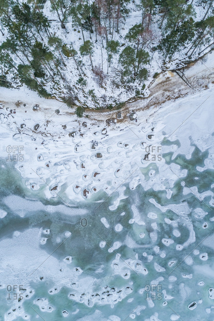 Aerial view of the frozen rocky sea on the coast of Muraste, Estonia