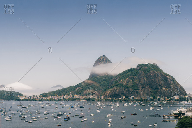 Sugarloaf Mountain, known locally as Pao de Acucar, covered in fog, Rio de Janeiro, Brazil, South America