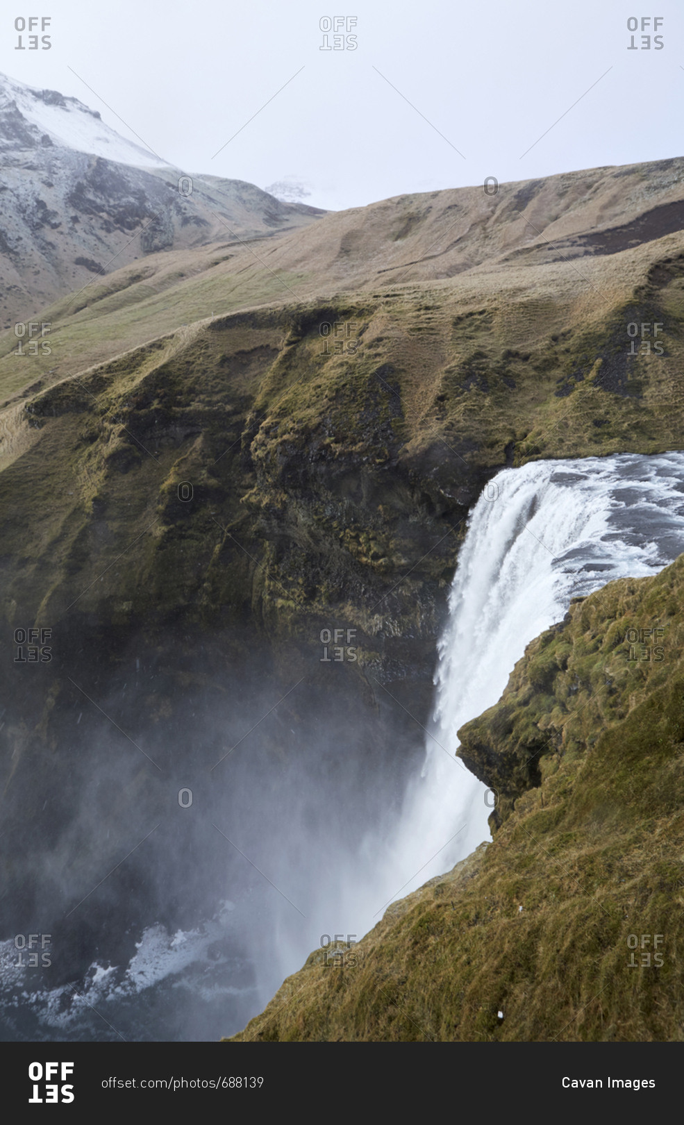Scenic view of Skogafoss Waterfall on mountain