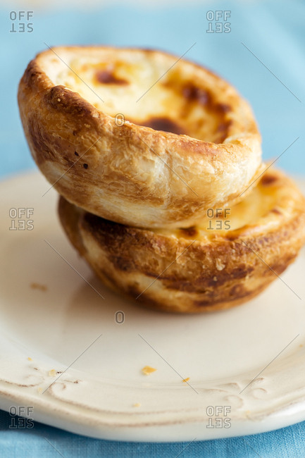Close up of traditional portuguese dessert pasteis de belem - baked puff pastry with custard